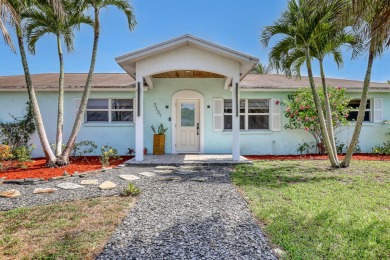 You won't find a property like this!!!3 bedrooms 2 bathrooms on Palm Beach National Golf and Country Club in Florida - for sale on GolfHomes.com, golf home, golf lot