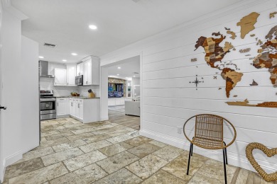 You won't find a property like this!!!3 bedrooms 2 bathrooms on Palm Beach National Golf and Country Club in Florida - for sale on GolfHomes.com, golf home, golf lot