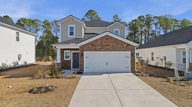 Perfectly positioned in the sought-after Clear Pond community on Myrtle Beach National Golf Course in South Carolina - for sale on GolfHomes.com, golf home, golf lot