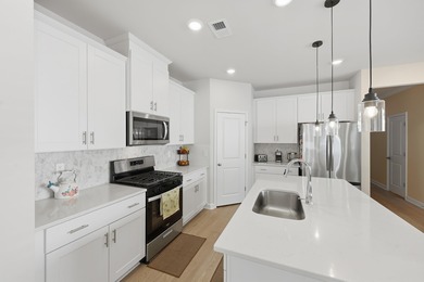 Perfectly positioned in the sought-after Clear Pond community on Myrtle Beach National Golf Course in South Carolina - for sale on GolfHomes.com, golf home, golf lot