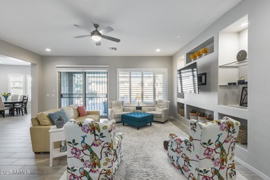 PRICED BELOW MARKET - MOVE-IN READY WITH OVER $73K IN BUILDER on Poston Butte Golf Club in Arizona - for sale on GolfHomes.com, golf home, golf lot