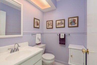 RARE OPPORTUNITY TO OWN A WATERFRONT CORNER VILLA NESTLED IN on Highland Lakes Executive Golf Course in Florida - for sale on GolfHomes.com, golf home, golf lot