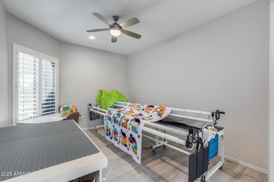 PRICED BELOW MARKET - MOVE-IN READY WITH OVER $73K IN BUILDER on Poston Butte Golf Club in Arizona - for sale on GolfHomes.com, golf home, golf lot