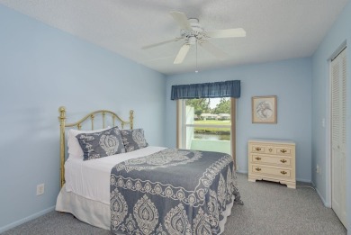 RARE OPPORTUNITY TO OWN A WATERFRONT CORNER VILLA NESTLED IN on Highland Lakes Executive Golf Course in Florida - for sale on GolfHomes.com, golf home, golf lot