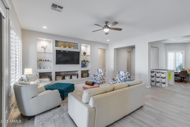 PRICED BELOW MARKET - MOVE-IN READY WITH OVER $73K IN BUILDER on Poston Butte Golf Club in Arizona - for sale on GolfHomes.com, golf home, golf lot