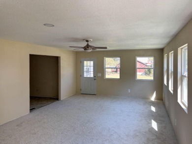 Sitting on a high peninsula in Janian Hills Subdivision, this 3 on Lost Woods Golf Course in Missouri - for sale on GolfHomes.com, golf home, golf lot