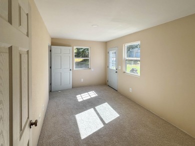 Sitting on a high peninsula in Janian Hills Subdivision, this 3 on Lost Woods Golf Course in Missouri - for sale on GolfHomes.com, golf home, golf lot