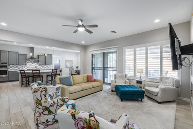 PRICED BELOW MARKET - MOVE-IN READY WITH OVER $73K IN BUILDER on Poston Butte Golf Club in Arizona - for sale on GolfHomes.com, golf home, golf lot