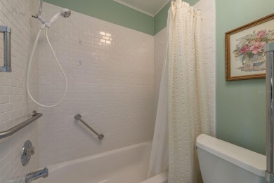 RARE OPPORTUNITY TO OWN A WATERFRONT CORNER VILLA NESTLED IN on Highland Lakes Executive Golf Course in Florida - for sale on GolfHomes.com, golf home, golf lot