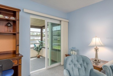 RARE OPPORTUNITY TO OWN A WATERFRONT CORNER VILLA NESTLED IN on Highland Lakes Executive Golf Course in Florida - for sale on GolfHomes.com, golf home, golf lot