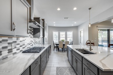 PRICED BELOW MARKET - MOVE-IN READY WITH OVER $73K IN BUILDER on Poston Butte Golf Club in Arizona - for sale on GolfHomes.com, golf home, golf lot