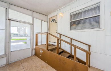 Rare Find! Welcome to this beautifully updated and lovingly on Tarpon Springs Golf Course in Florida - for sale on GolfHomes.com, golf home, golf lot