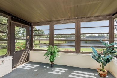 RARE OPPORTUNITY TO OWN A WATERFRONT CORNER VILLA NESTLED IN on Highland Lakes Executive Golf Course in Florida - for sale on GolfHomes.com, golf home, golf lot