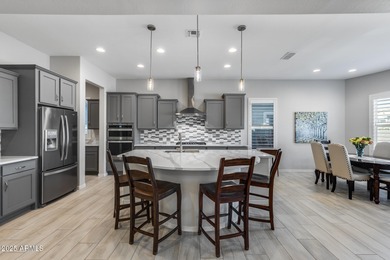 PRICED BELOW MARKET - MOVE-IN READY WITH OVER $73K IN BUILDER on Poston Butte Golf Club in Arizona - for sale on GolfHomes.com, golf home, golf lot