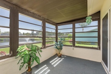 RARE OPPORTUNITY TO OWN A WATERFRONT CORNER VILLA NESTLED IN on Highland Lakes Executive Golf Course in Florida - for sale on GolfHomes.com, golf home, golf lot