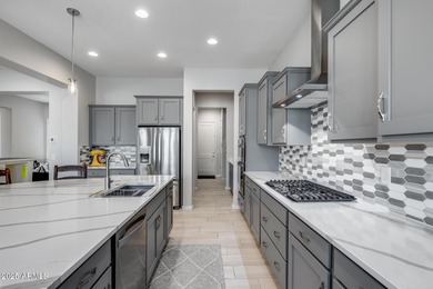 PRICED BELOW MARKET - MOVE-IN READY WITH OVER $73K IN BUILDER on Poston Butte Golf Club in Arizona - for sale on GolfHomes.com, golf home, golf lot