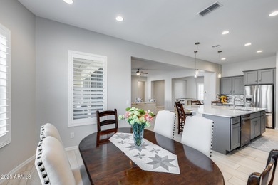 PRICED BELOW MARKET - MOVE-IN READY WITH OVER $73K IN BUILDER on Poston Butte Golf Club in Arizona - for sale on GolfHomes.com, golf home, golf lot