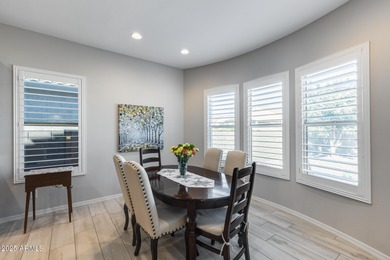 PRICED BELOW MARKET - MOVE-IN READY WITH OVER $73K IN BUILDER on Poston Butte Golf Club in Arizona - for sale on GolfHomes.com, golf home, golf lot