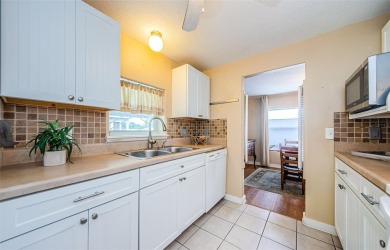 Rare Find! Welcome to this beautifully updated and lovingly on Tarpon Springs Golf Course in Florida - for sale on GolfHomes.com, golf home, golf lot