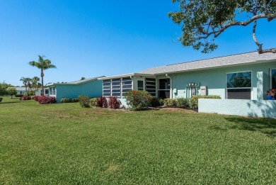 RARE OPPORTUNITY TO OWN A WATERFRONT CORNER VILLA NESTLED IN on Highland Lakes Executive Golf Course in Florida - for sale on GolfHomes.com, golf home, golf lot