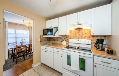 Rare Find! Welcome to this beautifully updated and lovingly on Tarpon Springs Golf Course in Florida - for sale on GolfHomes.com, golf home, golf lot