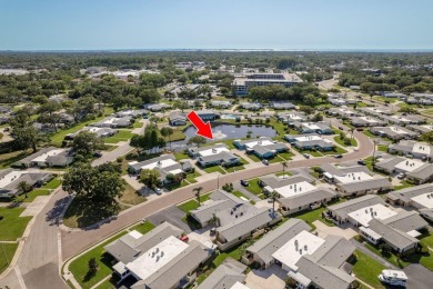 RARE OPPORTUNITY TO OWN A WATERFRONT CORNER VILLA NESTLED IN on Highland Lakes Executive Golf Course in Florida - for sale on GolfHomes.com, golf home, golf lot