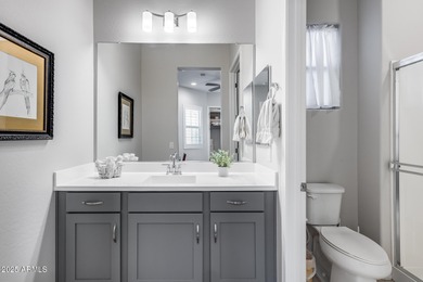 PRICED BELOW MARKET - MOVE-IN READY WITH OVER $73K IN BUILDER on Poston Butte Golf Club in Arizona - for sale on GolfHomes.com, golf home, golf lot