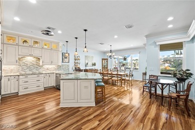 EXTRAS GALORE! FULLY CUSTOM LAKEFRONT LUXURY... MOVE-IN READY on Herons Glen Golf and Country Club in Florida - for sale on GolfHomes.com, golf home, golf lot