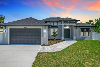 BRAND NEW LUXURIOUS NORTH PORT POOL HOME - CITY WATER, OVERSIZED for sale on GolfHomes.com