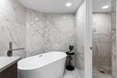 Experience exceptional living in this beautifully renovated on Gleneagles Golf and Country Club in Florida - for sale on GolfHomes.com, golf home, golf lot
