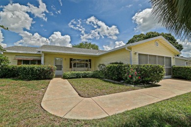 Priced Below Market--Investor or Handyman Special! This split on The Links of Spruce Creek in Florida - for sale on GolfHomes.com, golf home, golf lot