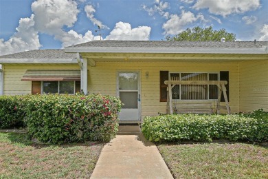 Priced Below Market--Investor or Handyman Special! This split on The Links of Spruce Creek in Florida - for sale on GolfHomes.com, golf home, golf lot