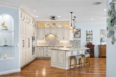 EXTRAS GALORE! FULLY CUSTOM LAKEFRONT LUXURY... MOVE-IN READY on Herons Glen Golf and Country Club in Florida - for sale on GolfHomes.com, golf home, golf lot