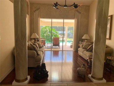 Environmental Home Builders built this absolutely stunning home on Tuscawilla Country Club in Florida - for sale on GolfHomes.com, golf home, golf lot