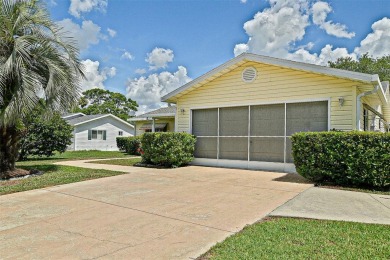 Priced Below Market--Investor or Handyman Special! This split on The Links of Spruce Creek in Florida - for sale on GolfHomes.com, golf home, golf lot