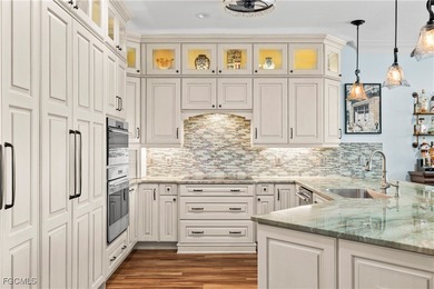 EXTRAS GALORE! FULLY CUSTOM LAKEFRONT LUXURY... MOVE-IN READY on Herons Glen Golf and Country Club in Florida - for sale on GolfHomes.com, golf home, golf lot