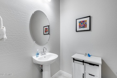 PRICED BELOW MARKET - MOVE-IN READY WITH OVER $73K IN BUILDER on Poston Butte Golf Club in Arizona - for sale on GolfHomes.com, golf home, golf lot