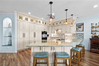 EXTRAS GALORE! FULLY CUSTOM LAKEFRONT LUXURY... MOVE-IN READY on Herons Glen Golf and Country Club in Florida - for sale on GolfHomes.com, golf home, golf lot