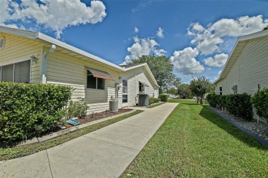 Priced Below Market--Investor or Handyman Special! This split on The Links of Spruce Creek in Florida - for sale on GolfHomes.com, golf home, golf lot