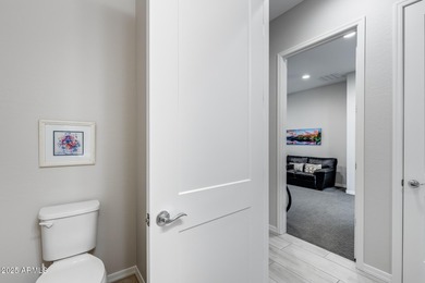 PRICED BELOW MARKET - MOVE-IN READY WITH OVER $73K IN BUILDER on Poston Butte Golf Club in Arizona - for sale on GolfHomes.com, golf home, golf lot