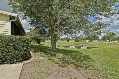 Priced Below Market--Investor or Handyman Special! This split on The Links of Spruce Creek in Florida - for sale on GolfHomes.com, golf home, golf lot
