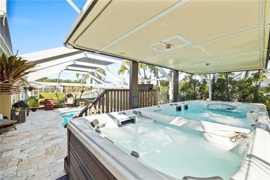 EXTRAS GALORE! FULLY CUSTOM LAKEFRONT LUXURY... MOVE-IN READY on Herons Glen Golf and Country Club in Florida - for sale on GolfHomes.com, golf home, golf lot