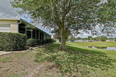 Priced Below Market--Investor or Handyman Special! This split on The Links of Spruce Creek in Florida - for sale on GolfHomes.com, golf home, golf lot