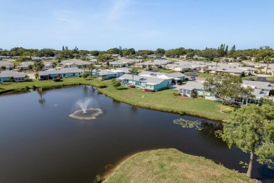 RARE OPPORTUNITY TO OWN A WATERFRONT CORNER VILLA NESTLED IN on Highland Lakes Executive Golf Course in Florida - for sale on GolfHomes.com, golf home, golf lot