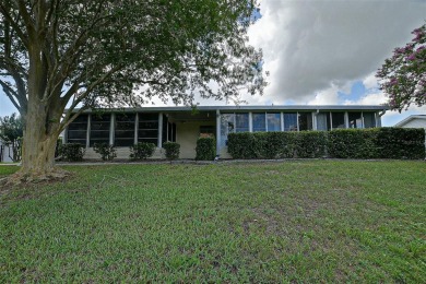 Priced Below Market--Investor or Handyman Special! This split on The Links of Spruce Creek in Florida - for sale on GolfHomes.com, golf home, golf lot