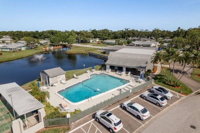 RARE OPPORTUNITY TO OWN A WATERFRONT CORNER VILLA NESTLED IN on Highland Lakes Executive Golf Course in Florida - for sale on GolfHomes.com, golf home, golf lot
