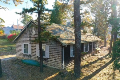 Discover a rare gem - a 3-bedroom ranch in a coveted location on Little Harbor Country Club in Massachusetts - for sale on GolfHomes.com, golf home, golf lot