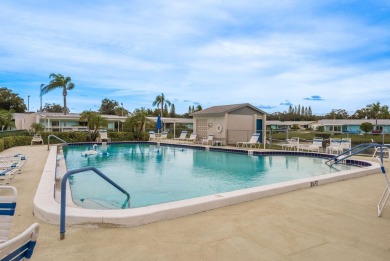 RARE OPPORTUNITY TO OWN A WATERFRONT CORNER VILLA NESTLED IN on Highland Lakes Executive Golf Course in Florida - for sale on GolfHomes.com, golf home, golf lot