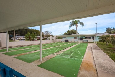 RARE OPPORTUNITY TO OWN A WATERFRONT CORNER VILLA NESTLED IN on Highland Lakes Executive Golf Course in Florida - for sale on GolfHomes.com, golf home, golf lot