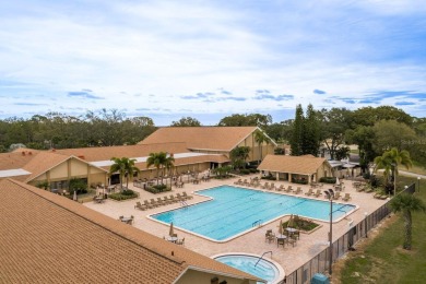 RARE OPPORTUNITY TO OWN A WATERFRONT CORNER VILLA NESTLED IN on Highland Lakes Executive Golf Course in Florida - for sale on GolfHomes.com, golf home, golf lot